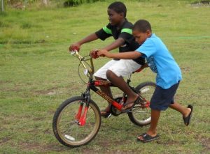 Two youth from Nevis Earn-A-Bike